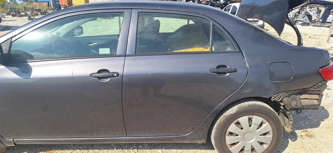 Toyota COROLLA E15 zacisk hamulcowy prawy lewy tył – zdjęcie 1