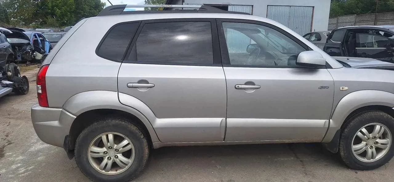 Hyundai TUCSON I YK drzwi prawy przód komplet – zdjęcie 1