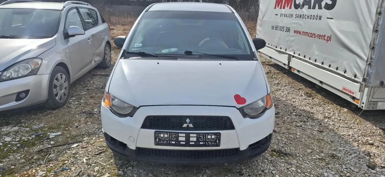 Mitsubishi COLT VI LIFT 1,1 75KM rozrusznik – zdjęcie 6