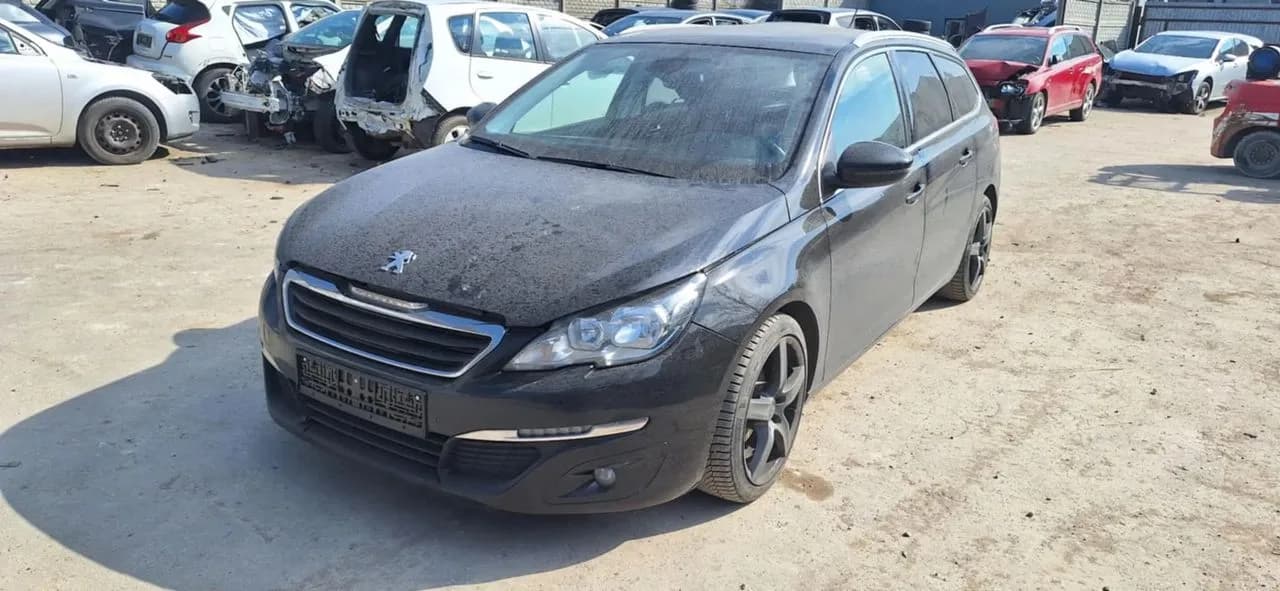 PEUGEOT 308 T9 II 1,6 B-HDI 120KM piasta zwrotnica lewy przód – zdjęcie 1