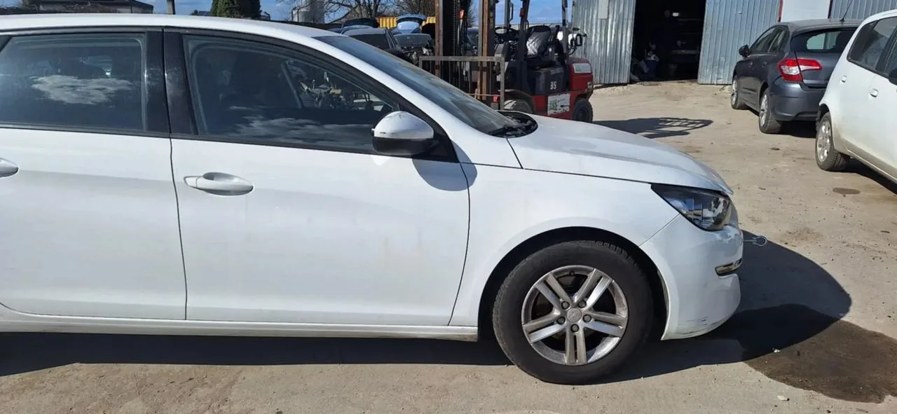 PEUGEOT 308 T9 1,6 EHDI 116KM piasta zwrotnica prawy przód – zdjęcie 1