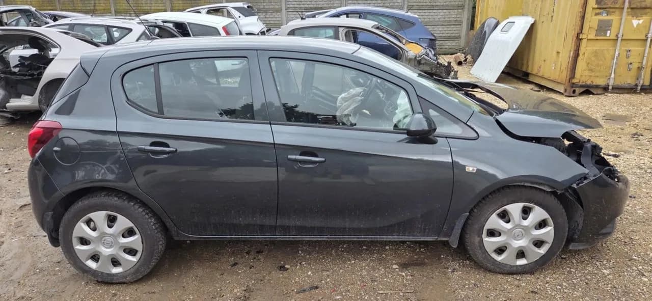 OPEL CORSA E 1,4 90KM mcperson amortyzator prawy przód – zdjęcie 1