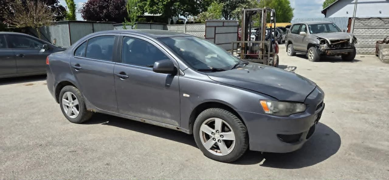 MITSUBISHI LANCER IX 1,8 MIVEC 143KM mcperson amortyzator prawy przód – zdjęcie 1