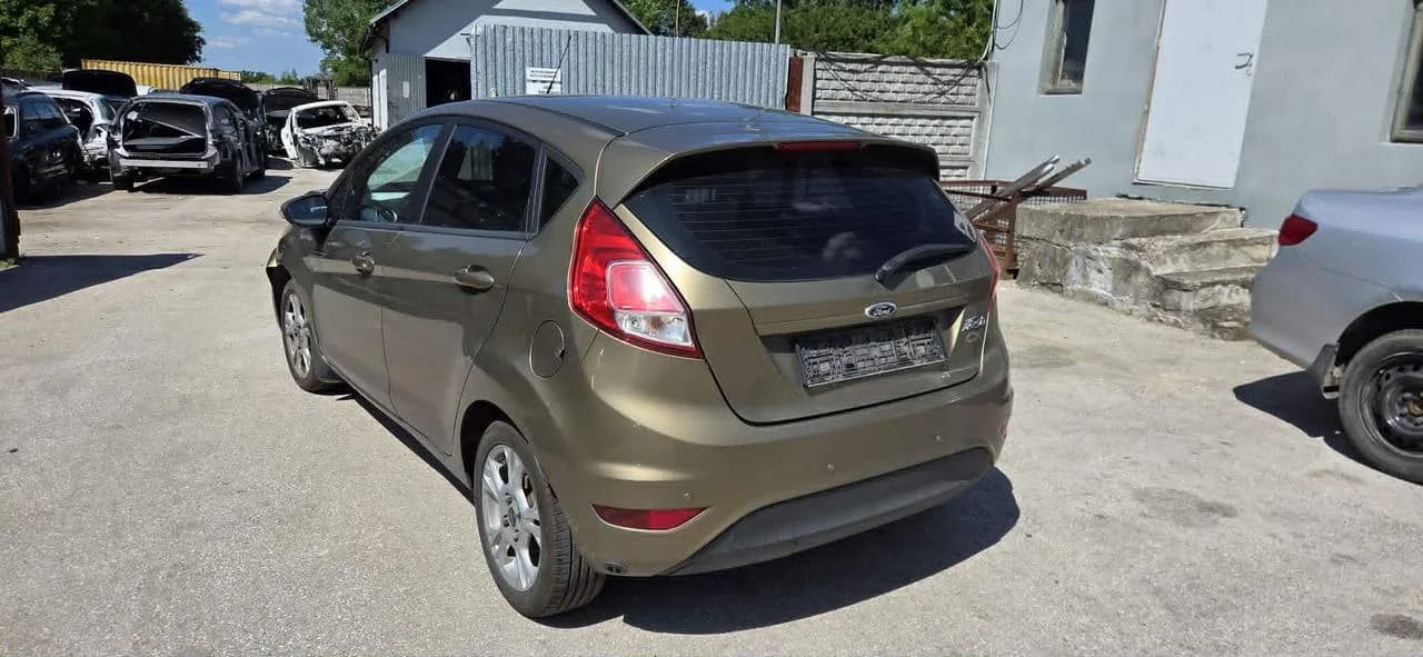 FORD FIESTA MK7 UC błotnik lewy tył – zdjęcie 1
