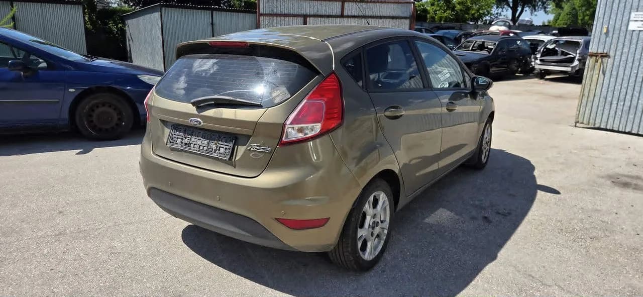 FORD FIESTA MK7 UC błotnik prawy tył – zdjęcie 1