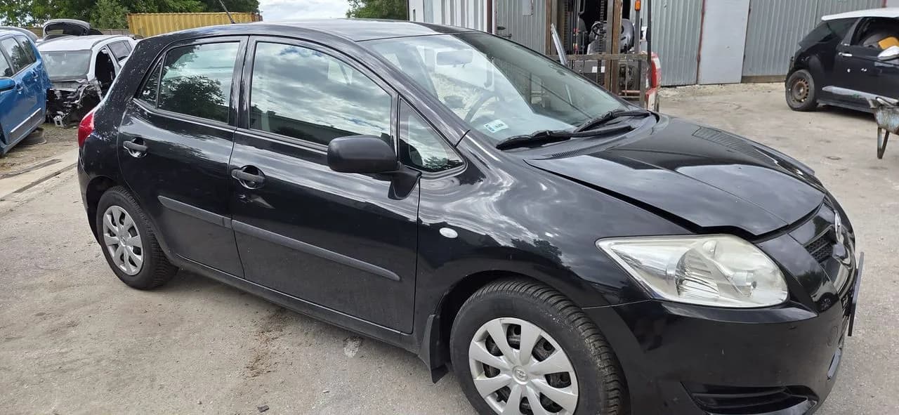 TOYOTA AURIS 1,4 D4D 90KM mcperson amortyzator prawy lewy przód – zdjęcie 1