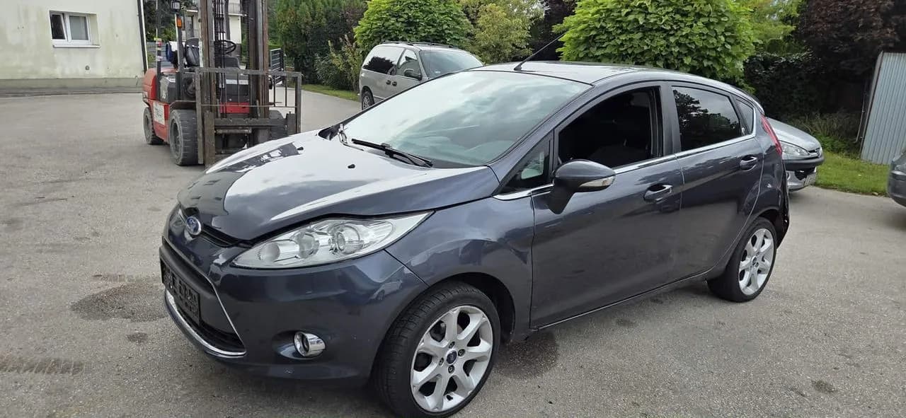 FORD FIESTA MK7 1,6TDCI 90KM mcperson amortyzator prawy lewy przód – zdjęcie 1