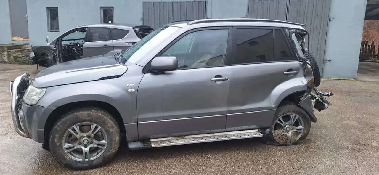 Suzuki GRAND VITARA II ZDL drzwi lewy przód komplet – zdjęcie 1