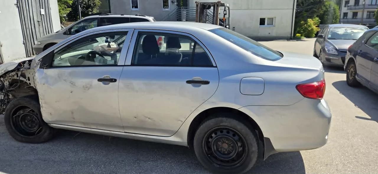 TOYOTA COROLLA E15 1G7 drzwi lewy tył komplet – zdjęcie 1